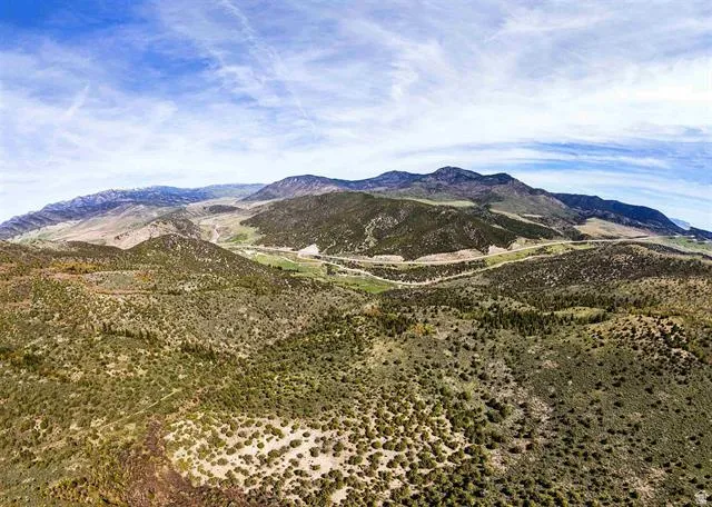 Expansive mountain landscape featuring varied terrain