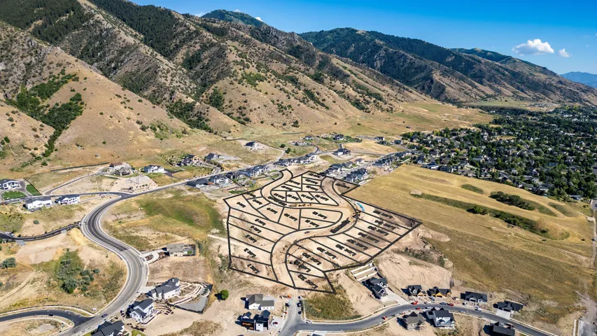 Aerial perspective showcasing a developing residential community with designated lots