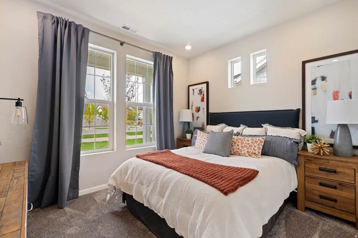 Bedroom featuring carpet flooring and light-toned walls