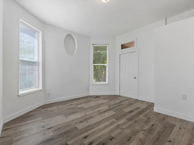 Unit 1- Large Bedroom with tall ceilings.