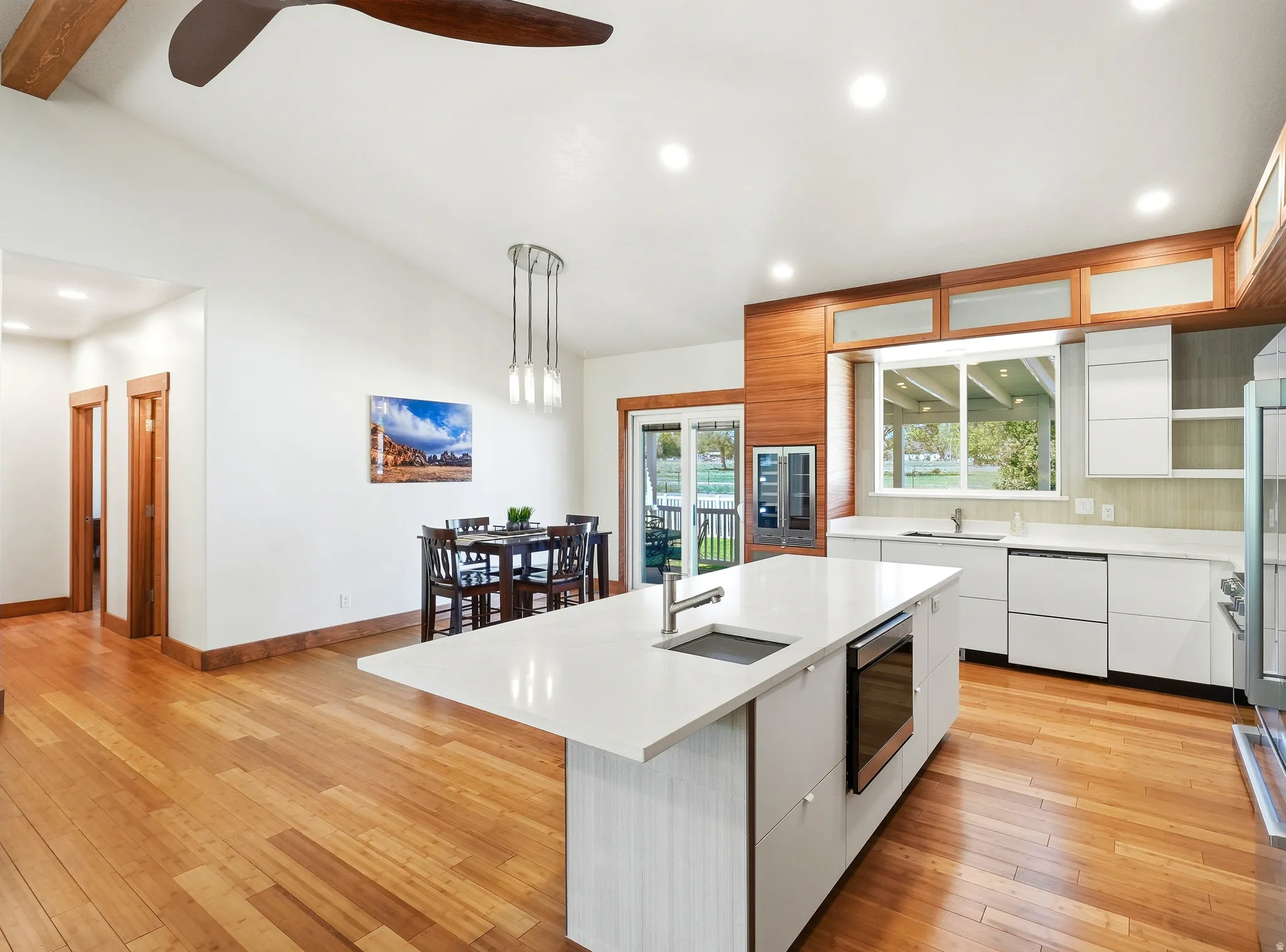 Seating at the island and in dining room.  Dishwasher is a double drawer, panel ready, knock to pause model
