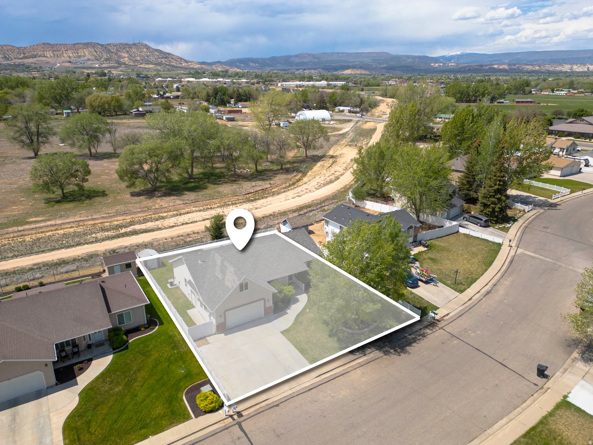 Aerial perspective highlighting the property's lot location