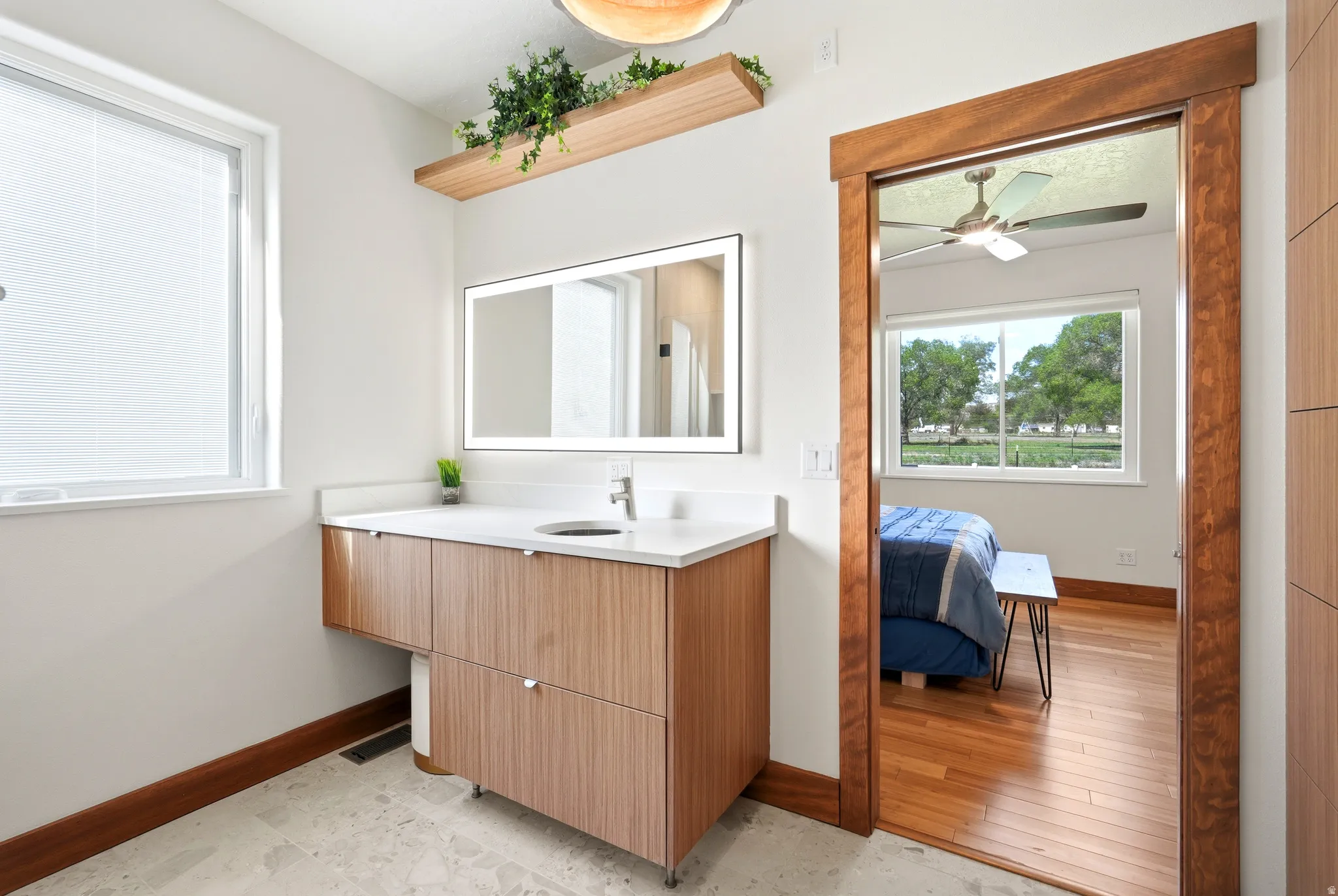 Vanity with sink and knee space for seated use.