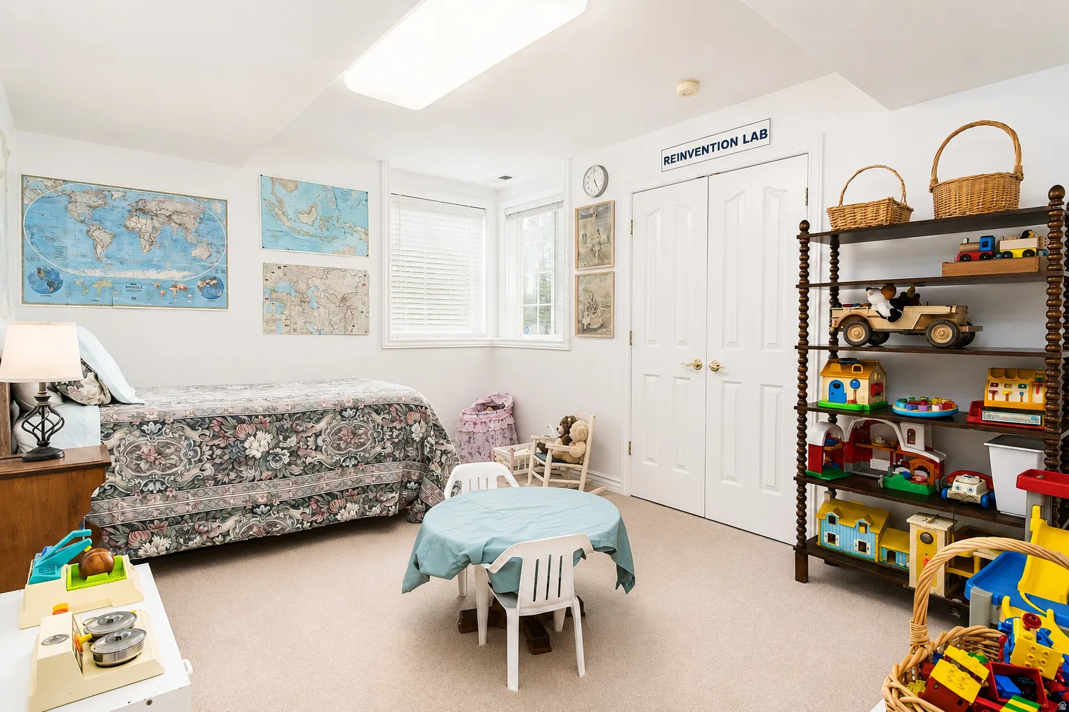 Carpeted room with a bed and double-door closet