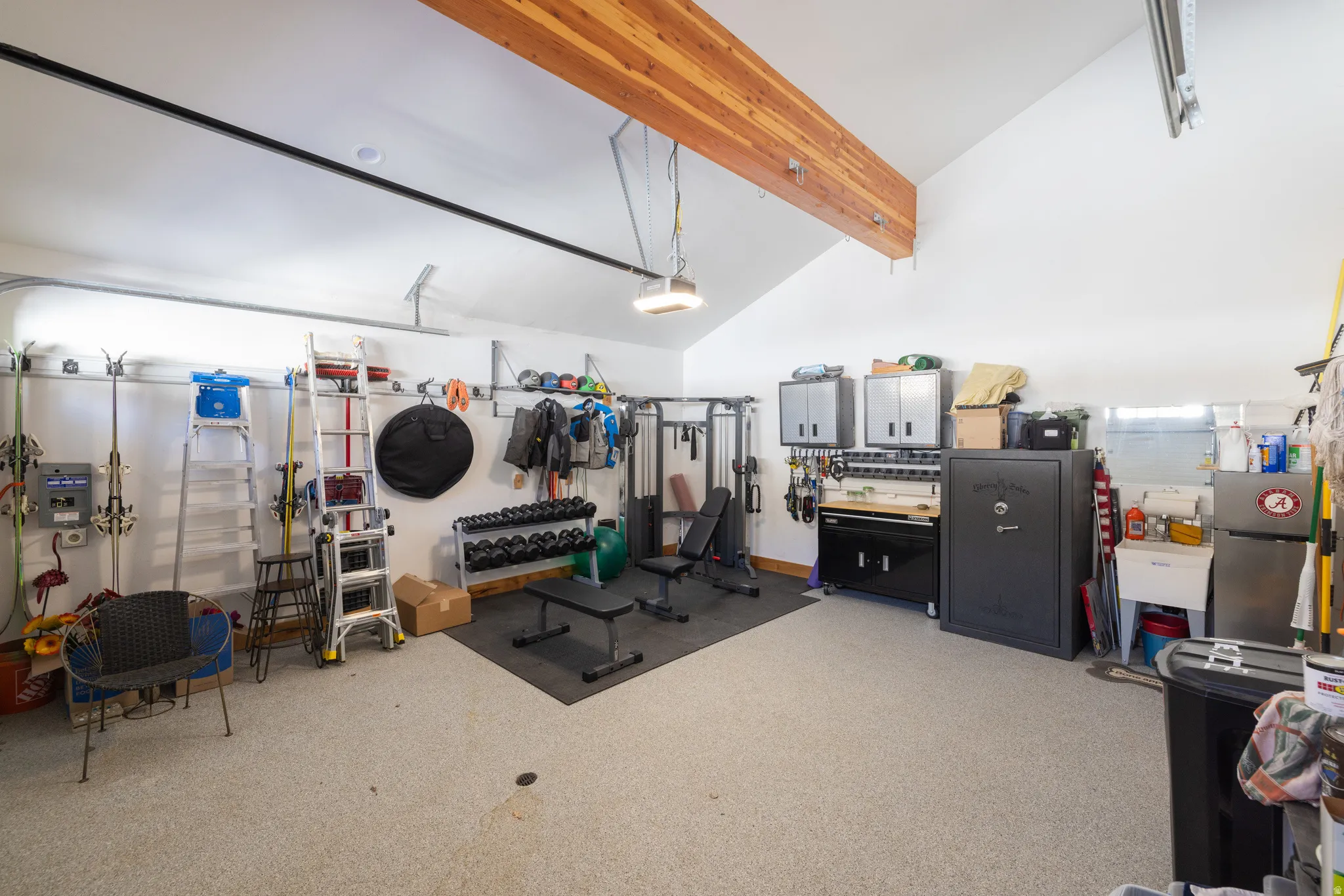 Garage with freestanding refrigerator