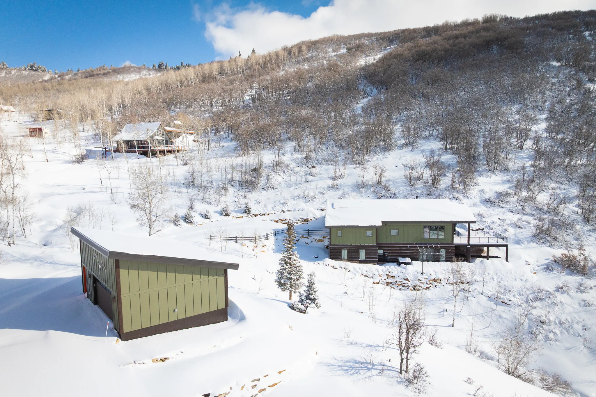 View of subject property with a mountain backdrop