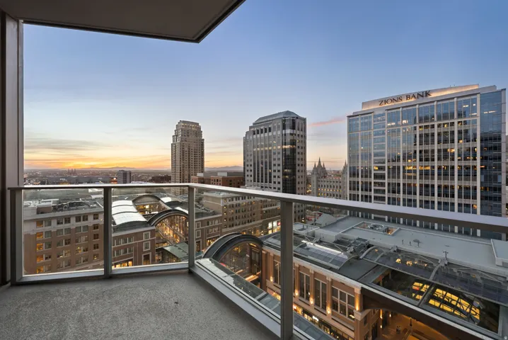 Balcony with concrete flooring and glass railings