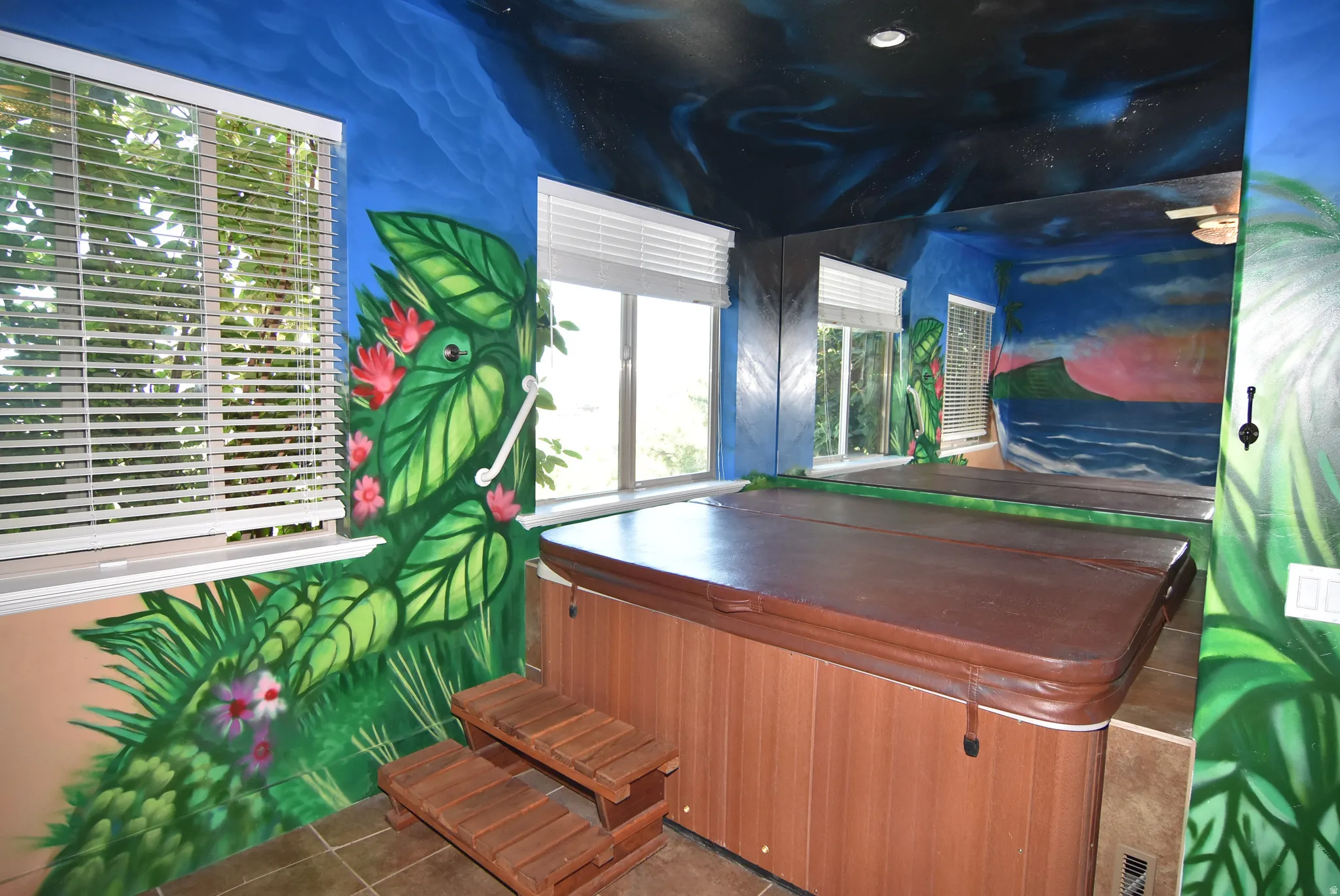 Indoor spa area featuring a wood-finish hot tub, wood steps, and tiled flooring