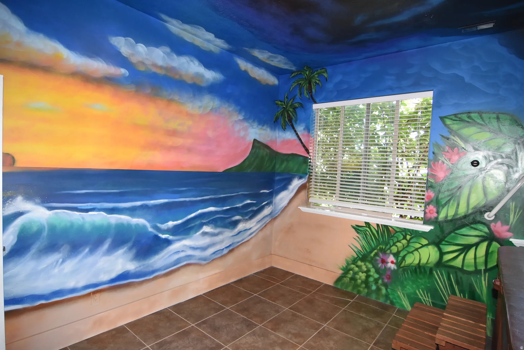 Custom wall murals featuring a tropical sunset and ocean scene