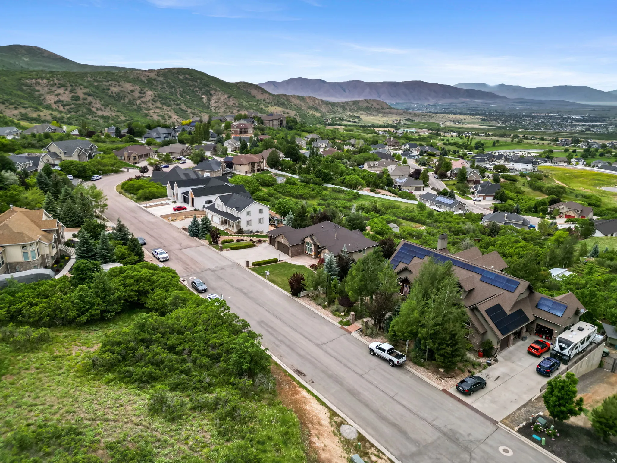 Expansive residential neighborhood featuring diverse architectural styles and mature landscaping