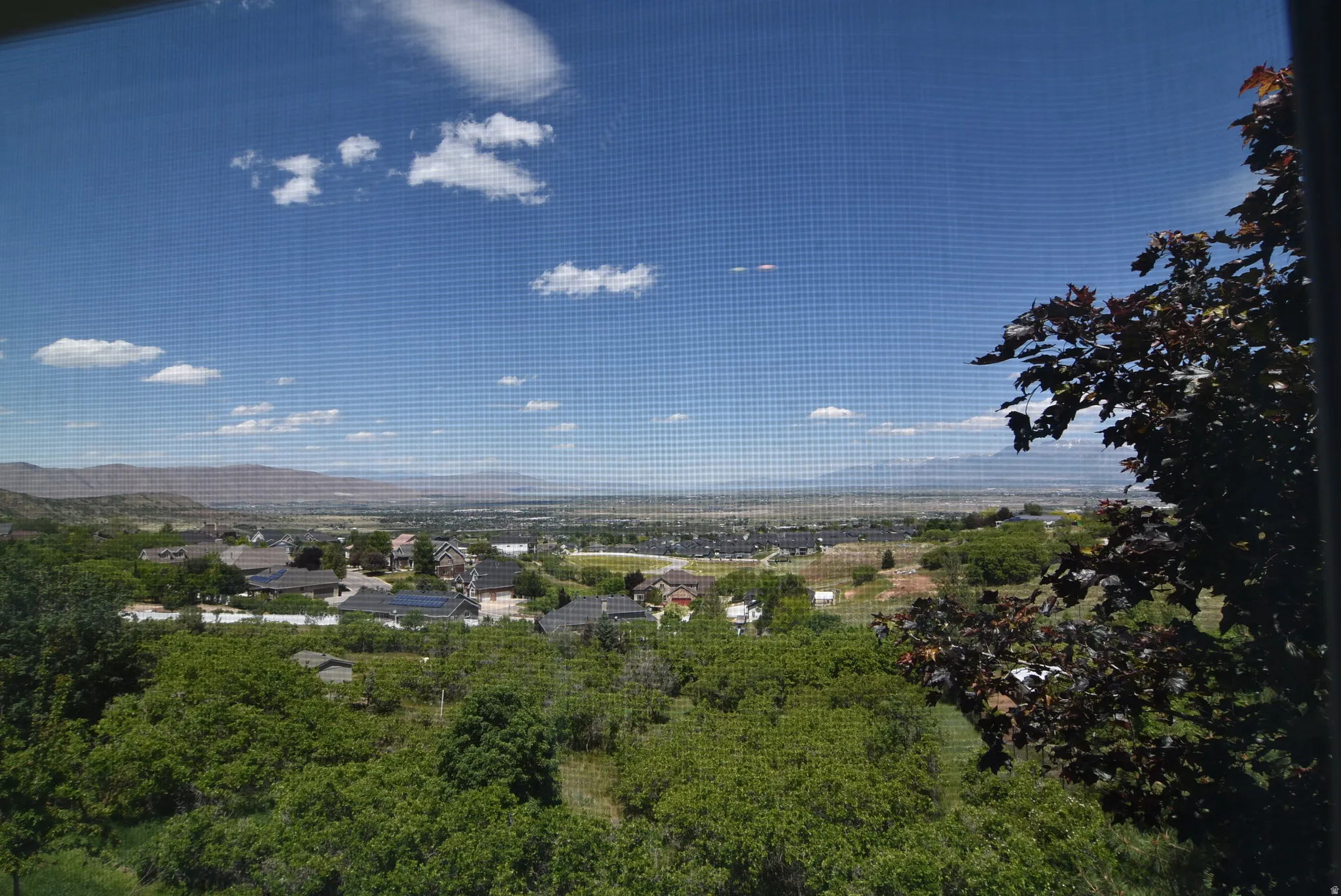View from Bedroom with Expansive landscape featuring distant mountains and a broad valley