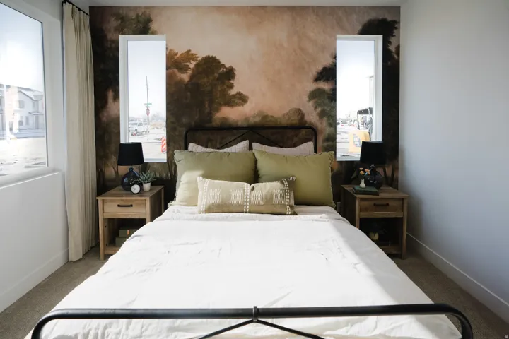 Accent wall featuring a scenic mural