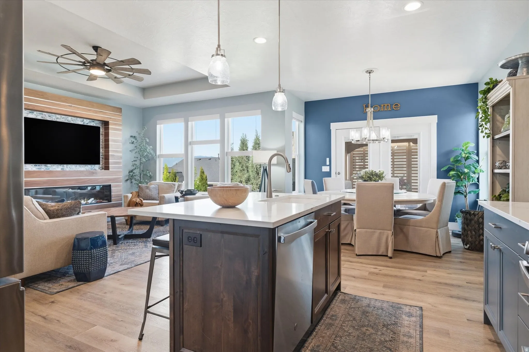 Open-concept living space with wood-finish flooring throughout