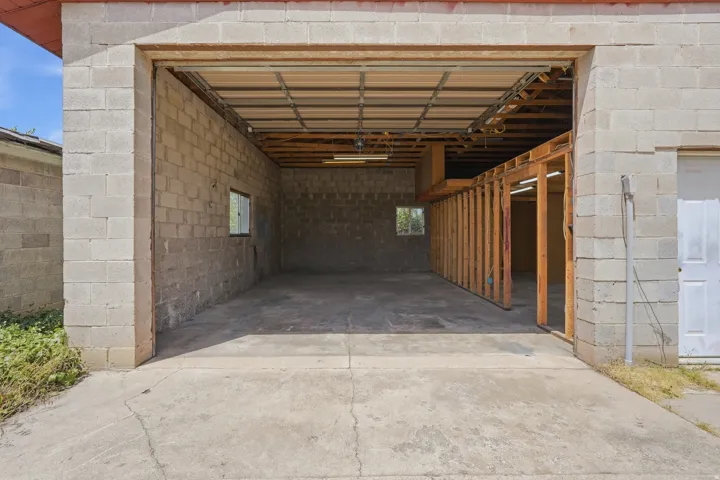 Oversized Detached Garage with workspace and tons of storage!
