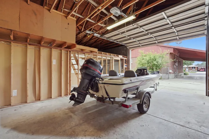 Large detached garage to hold toys, cars, storage, gym, etc.