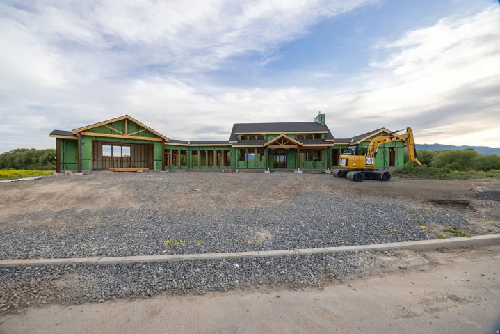 New construction featuring framing and roof installation