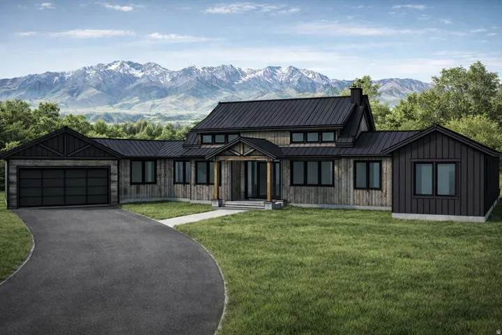 Contemporary farmhouse exterior featuring vertical wood siding and a dark metal roof