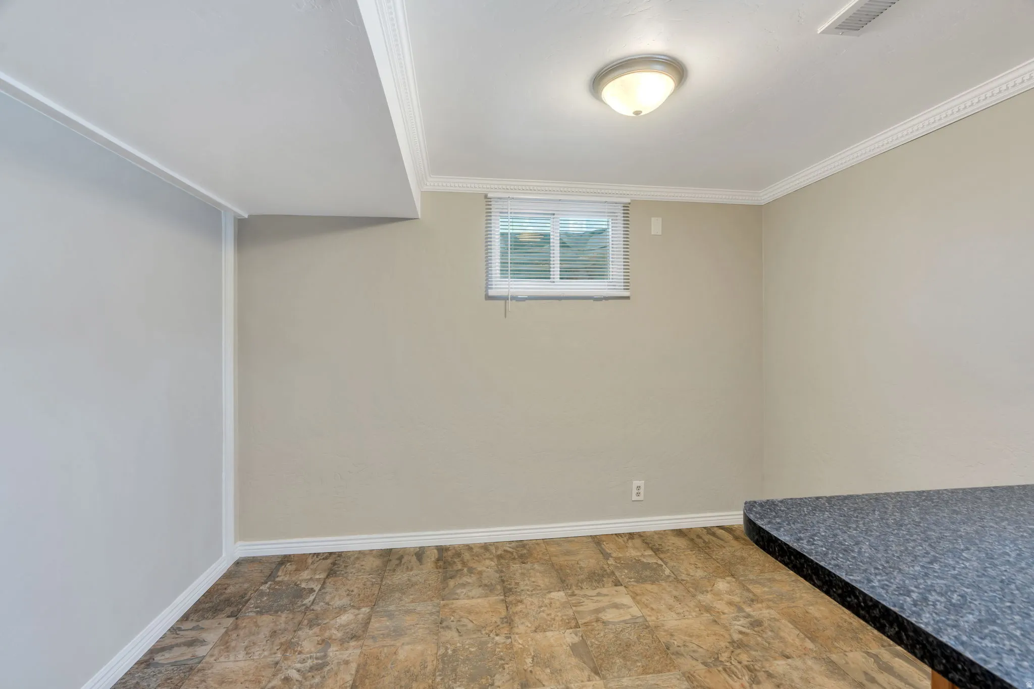 Apartment Dining area, window with blinds, and an overhead dome light