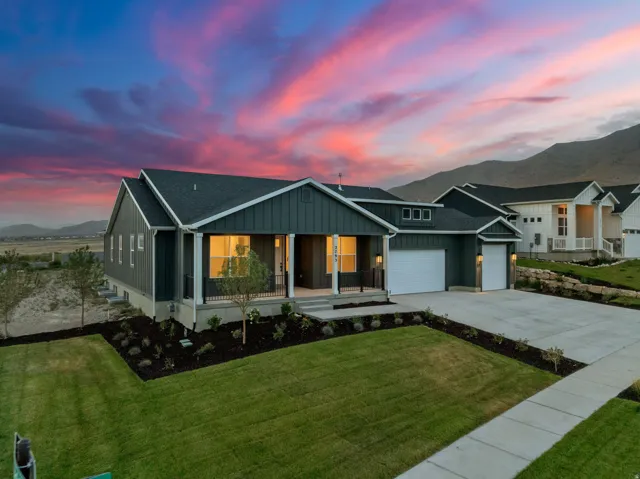 Uinta Elevation A with front yard landscaping installed.