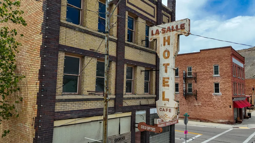 Historic masonry building featuring a multi-story design with prominent brickwork