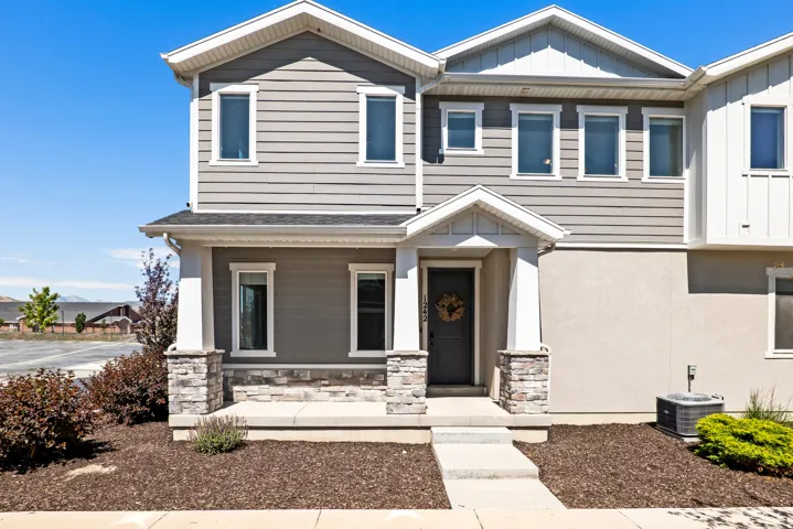 Modern exterior featuring horizontal siding and board-and-batten accents