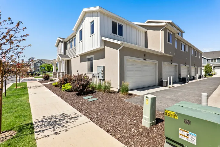 Exterior with multi-textured facade featuring stucco and horizontal siding