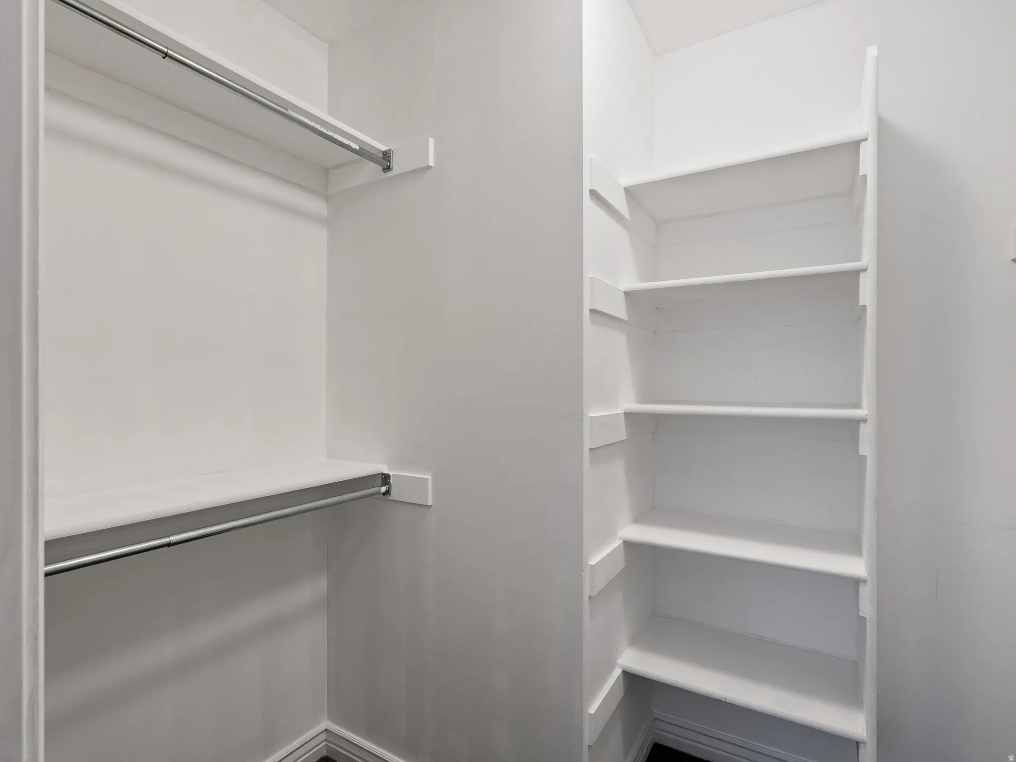 Closet with built-in shelving and hanging rods