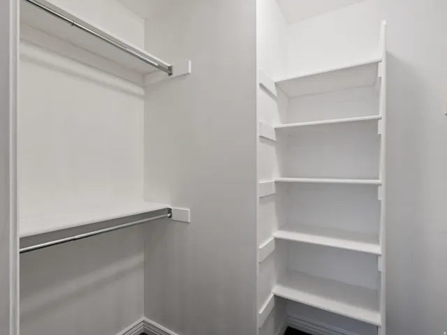 Closet with built-in shelving and hanging rods