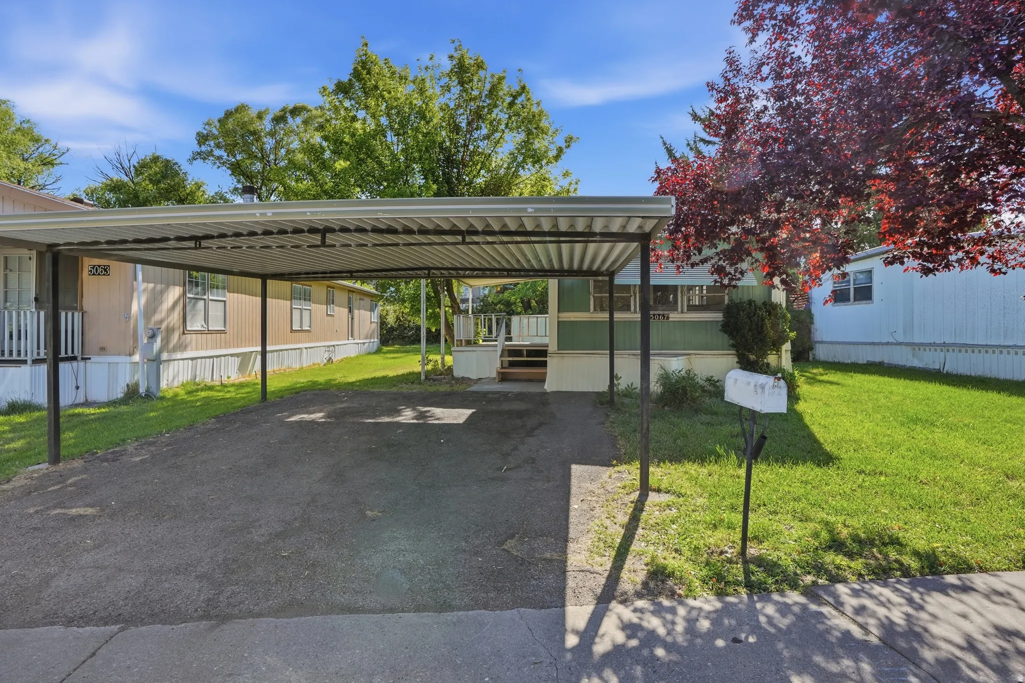 Covered carport providing sheltered parking