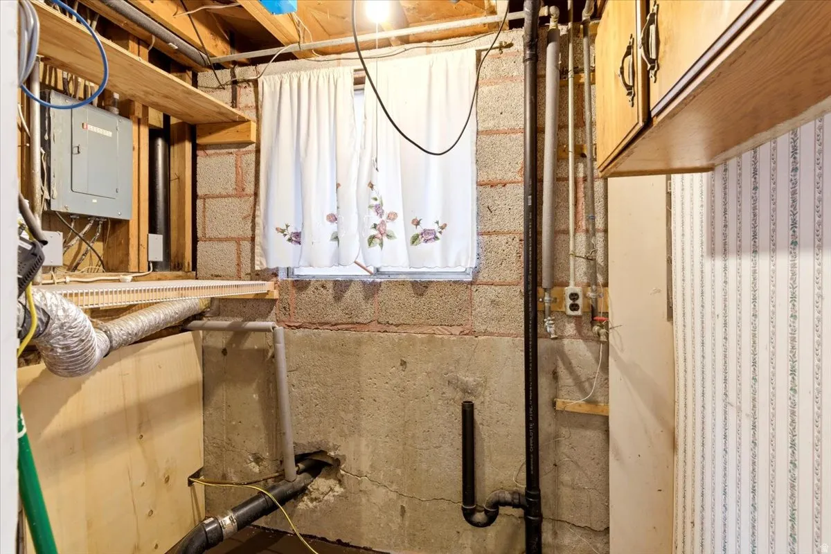 Concrete block foundation walls with exposed wood framing
