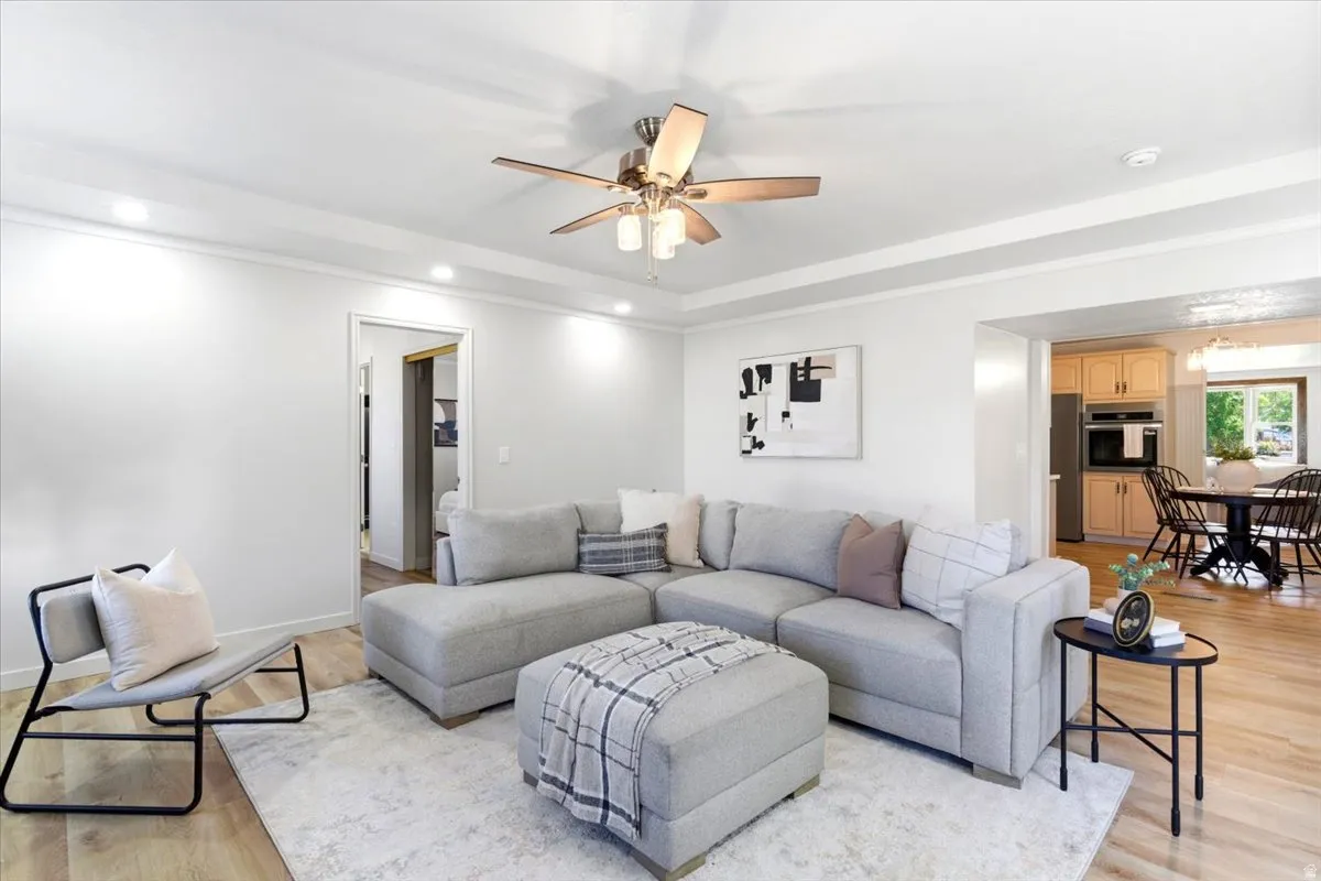 Living area featuring recessed lighting and wood-finish flooring