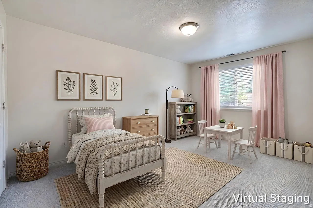 Bright room featuring neutral wall tones and light-toned carpeting