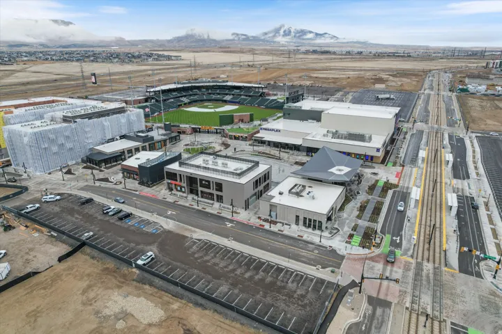 Expansive aerial perspective of "The Ball Park", Megaplex Theater, bowling alley and resturants.