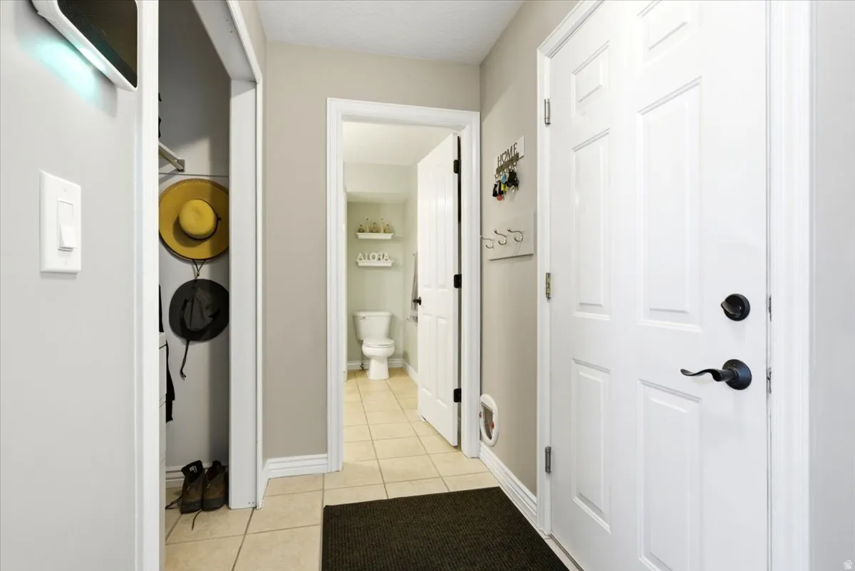Entrance to garage and ¾ bath