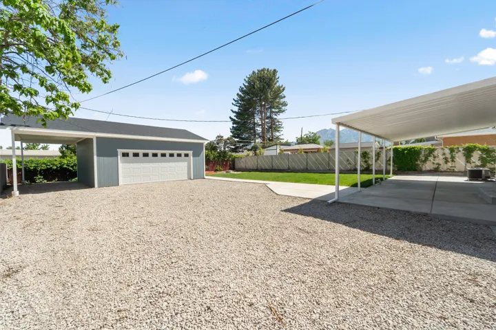Expansive gravel driveway providing extensive parking