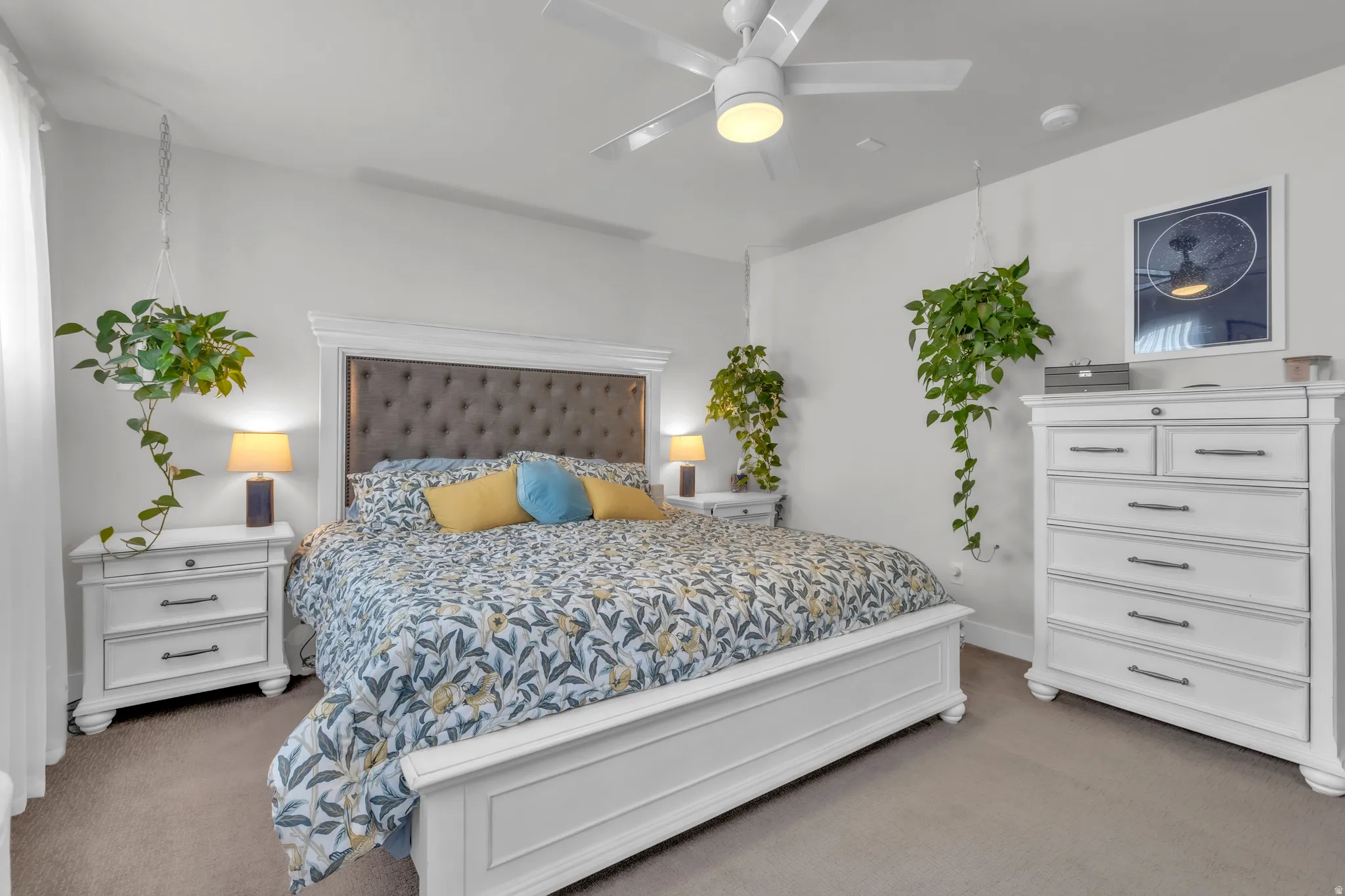 Bedroom featuring soft gray carpeting and light gray wall paint