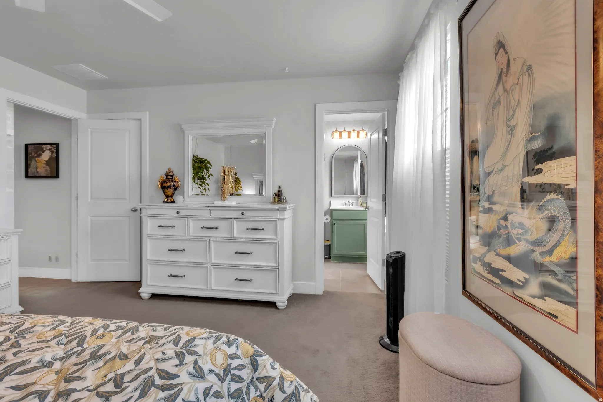 Carpeted room with light gray walls and white trim