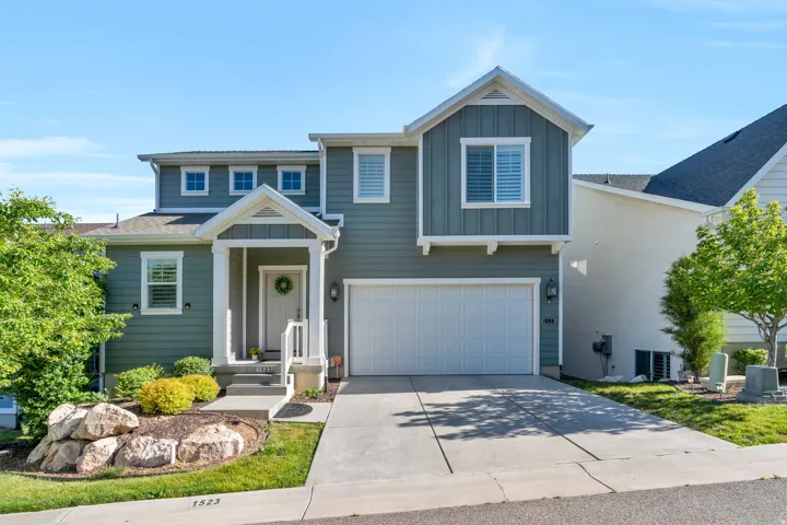 Contemporary exterior with horizontal siding and vertical board and batten accents