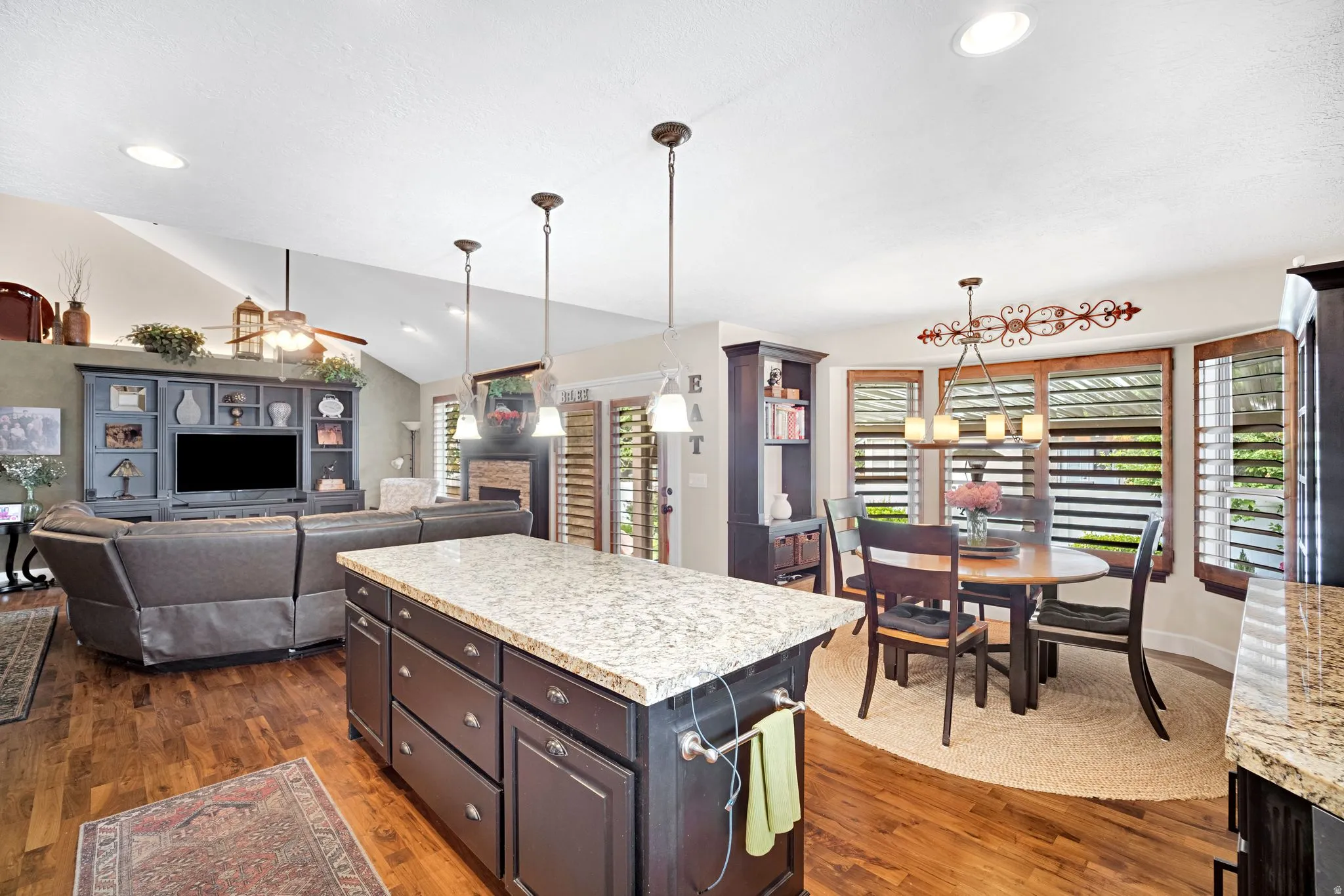 View from kitchen to dining and great room.  Built in hutch in dining room.