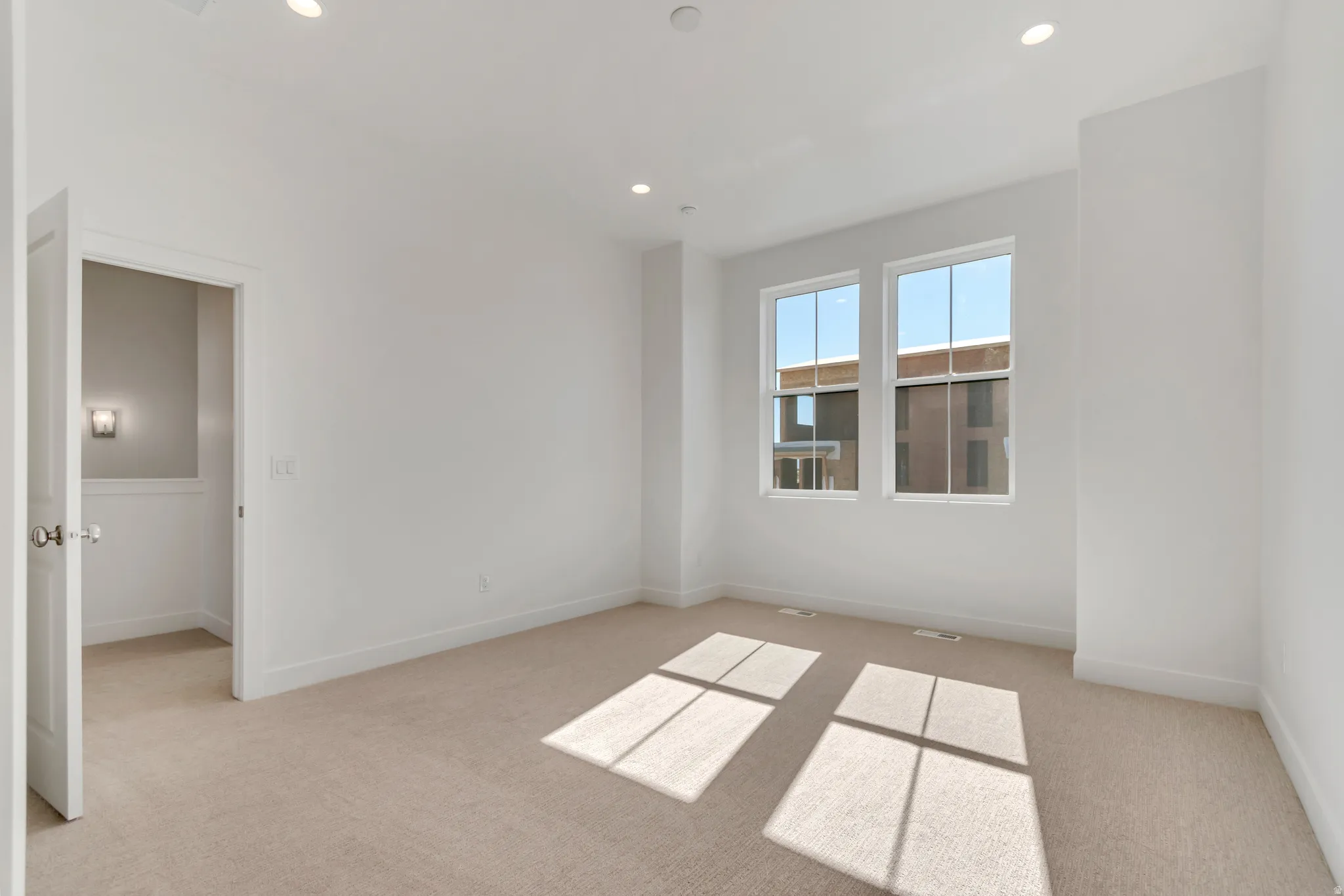 Owner's Suite with 10' Ceilings and expansive light