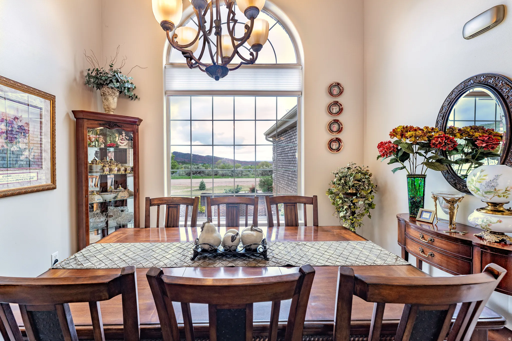 Formal dining area with arched window