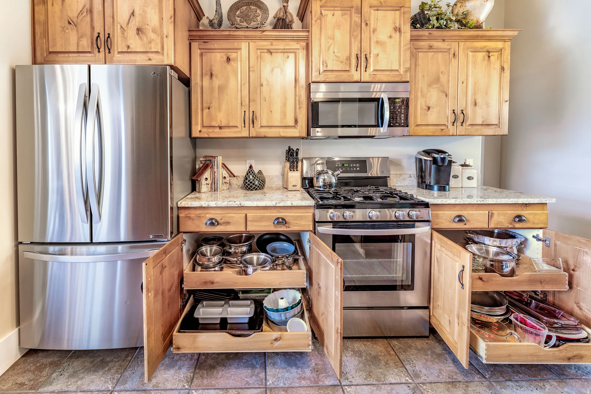 Kitchen featuring pull out drawers