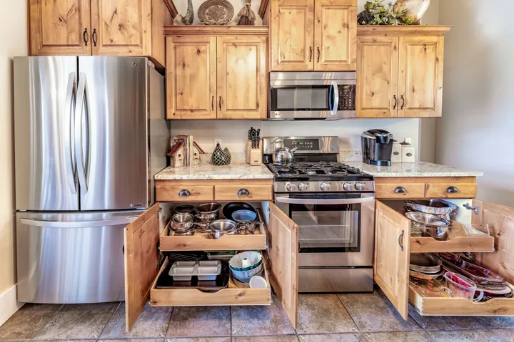 Kitchen featuring pull out drawers
