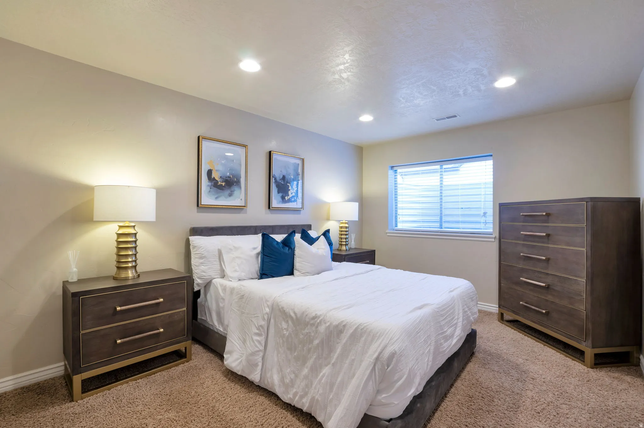 Neutral wall tones complementing soft brown carpeting
