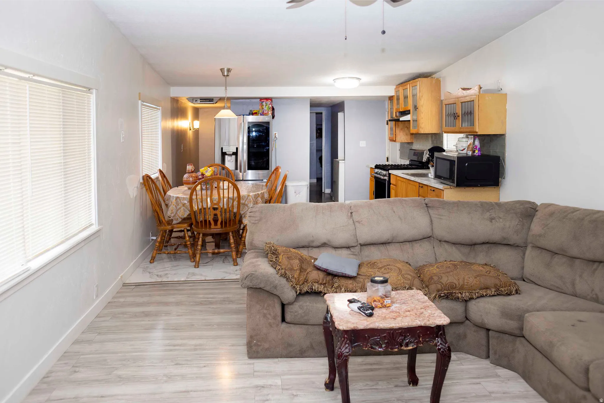 Open concept interior featuring light wood-finish flooring