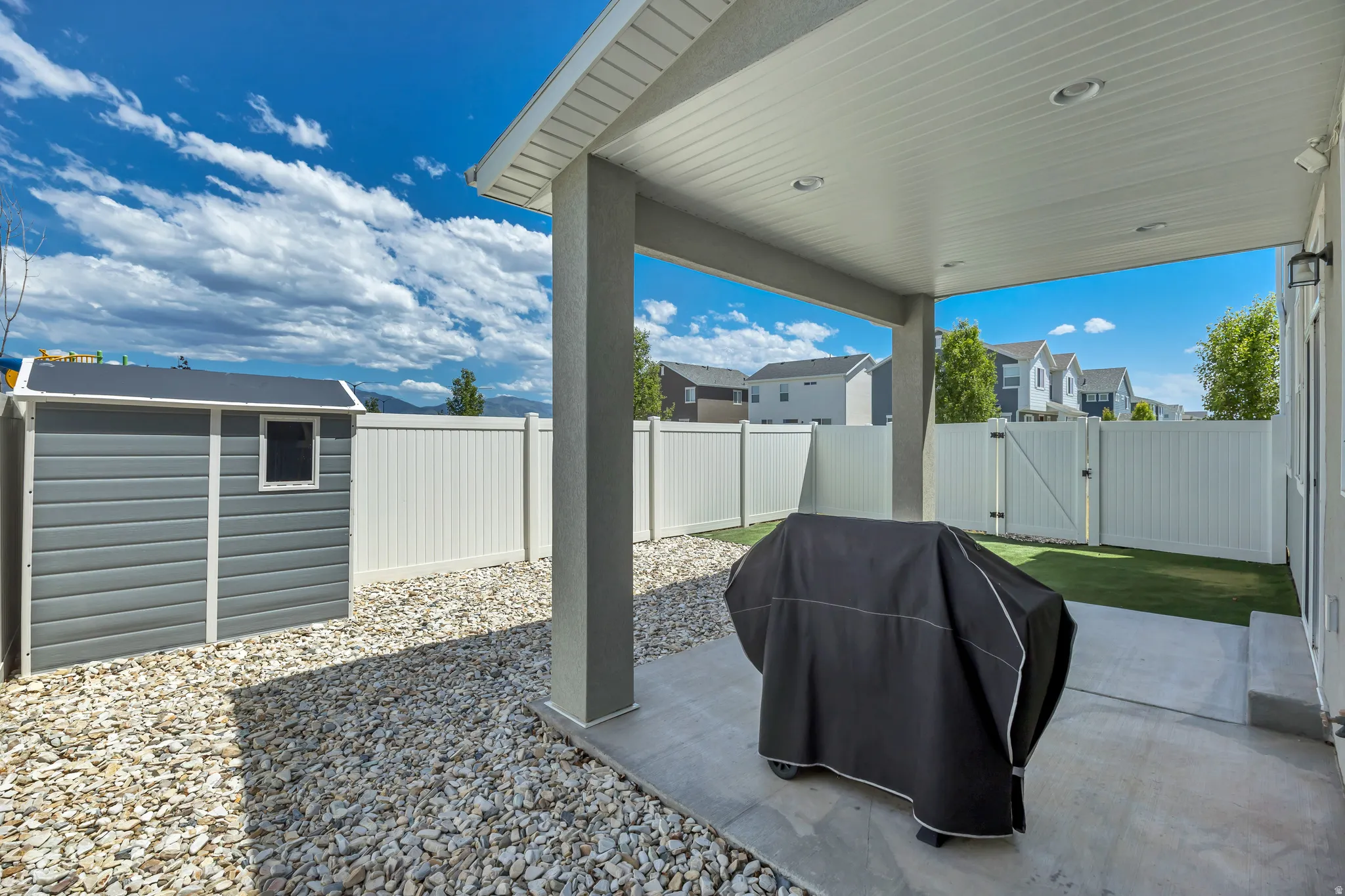 Covered patio featuring recessed lighting