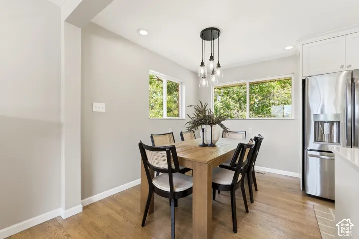 Dining area featuring wood-finish flooring and neutral wall tones