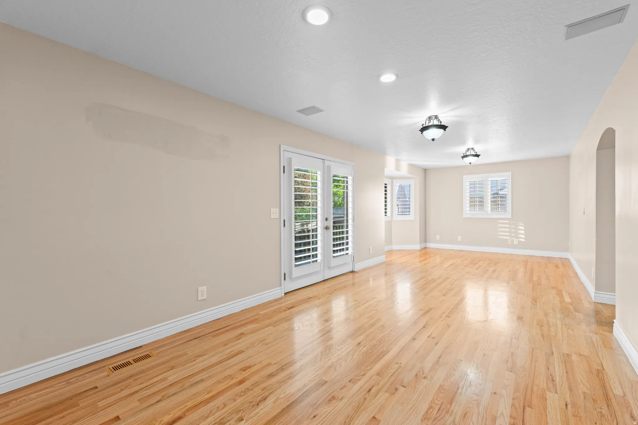 Spacious interior with natural wood flooring
