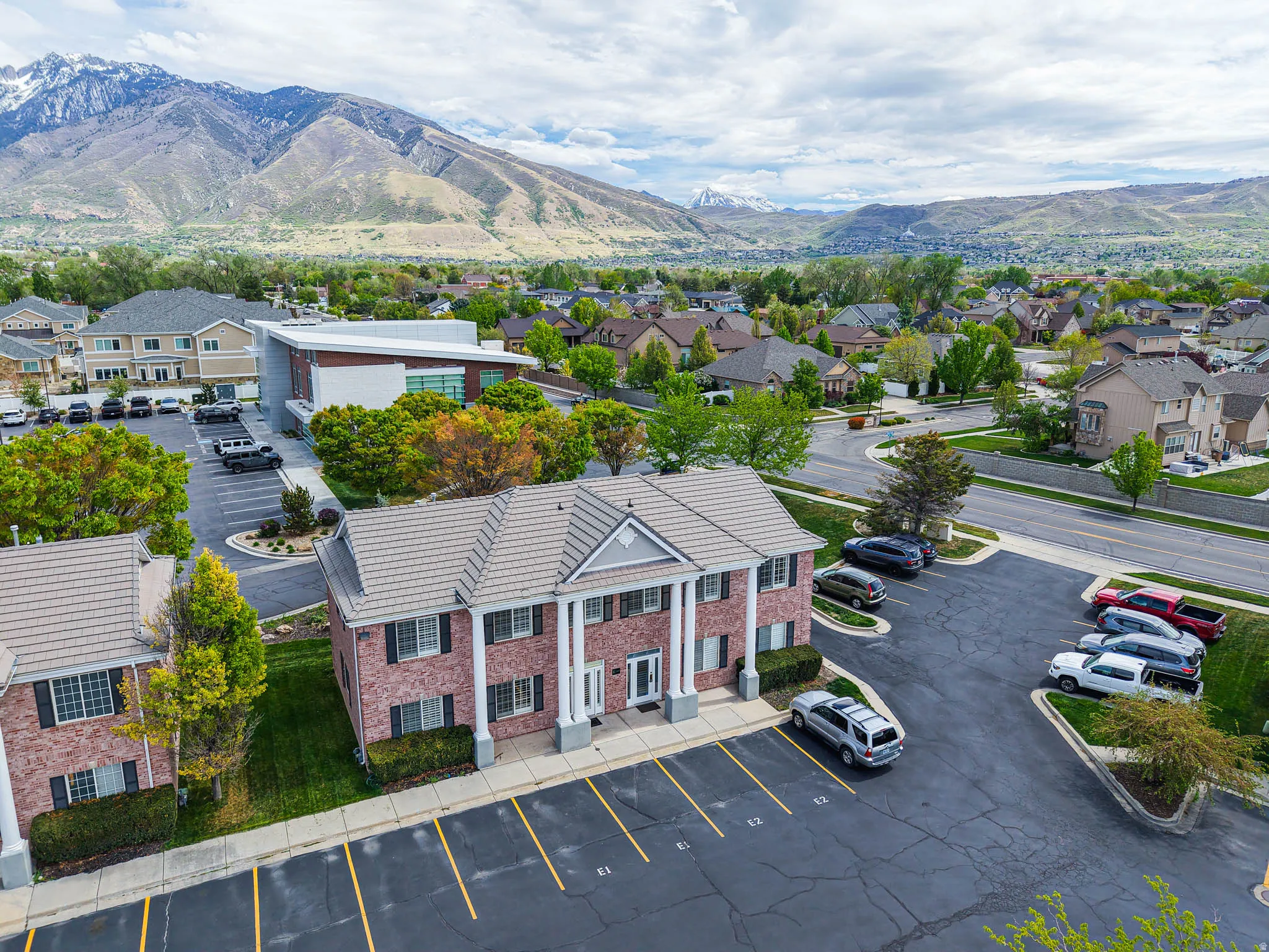 Aerial perspective of suburban area featuring mountains