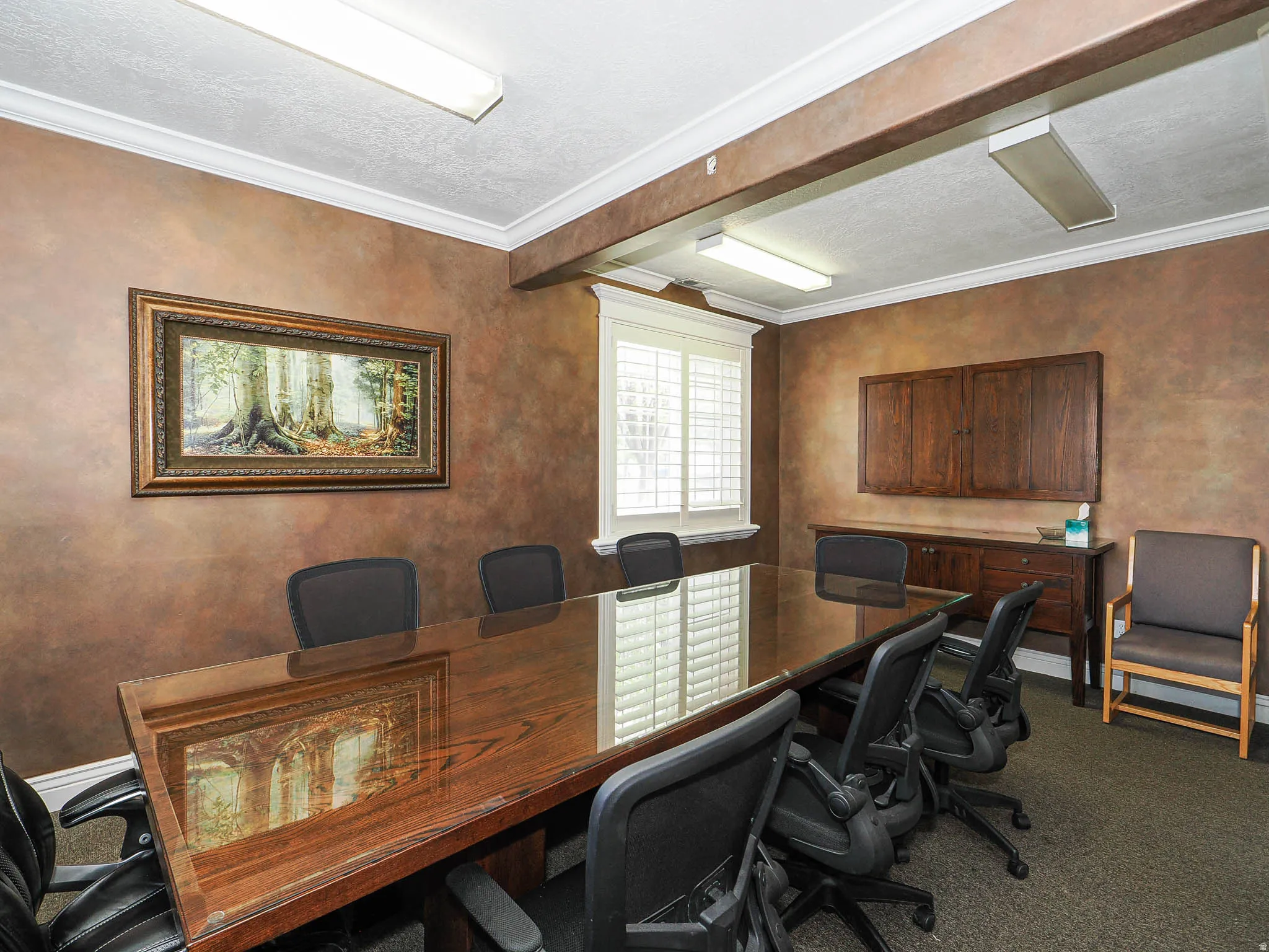 Office featuring crown molding and a textured ceiling